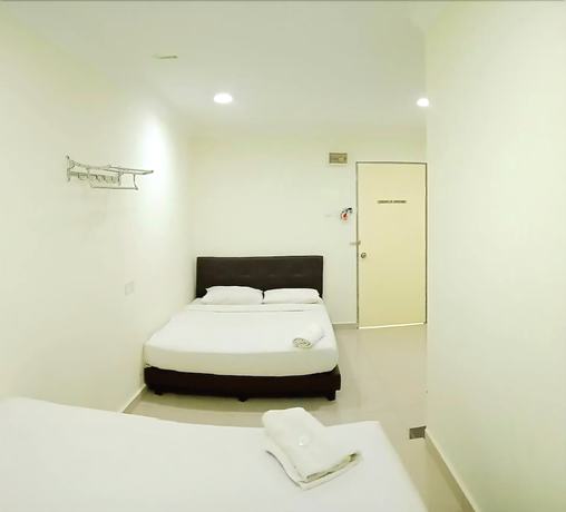 Imagen de la habitación del Hotel Cattleya Glory. Foto 10