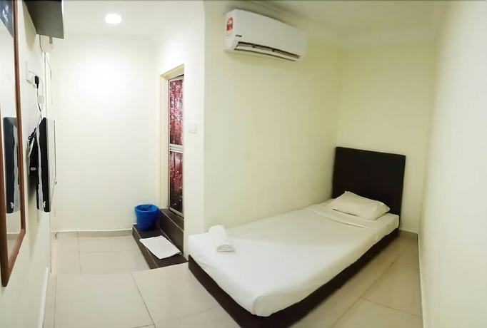 Imagen de la habitación del Hotel Cattleya Glory. Foto 11