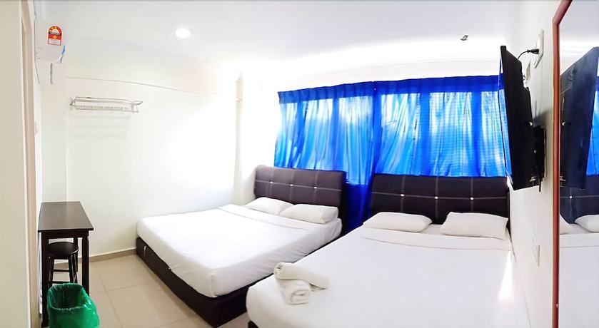 Imagen de la habitación del Hotel Cattleya Glory. Foto 13