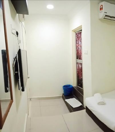 Imagen de la habitación del Hotel Cattleya Glory. Foto 14