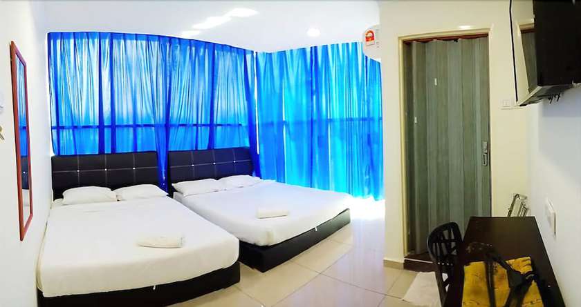 Imagen de la habitación del Hotel Cattleya Glory. Foto 15