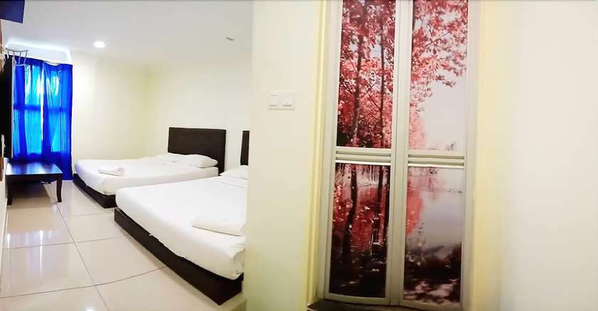 Imagen de la habitación del Hotel Cattleya Glory. Foto 17