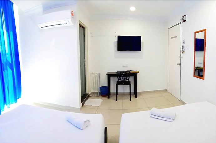 Imagen de la habitación del Hotel Cattleya Glory. Foto 18