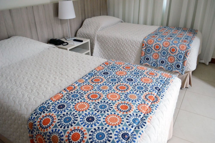 Imagen de la habitación del Hotel Catussaba Suites. Foto 6