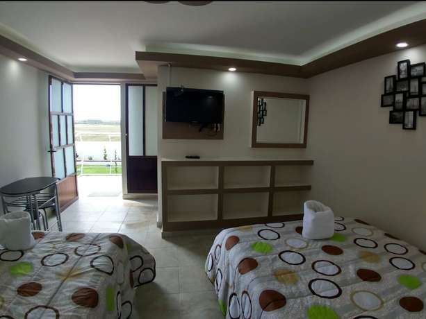 Imagen de la habitación del Hotel Caudillos Inn. Foto 5