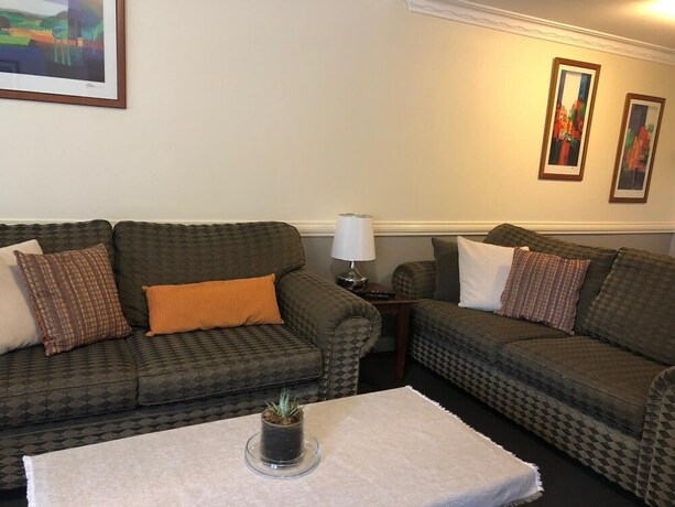 Imagen de la habitación del Hotel Caulta Apartments. Foto 31