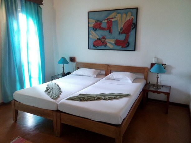 Imagen de la habitación del Hotel Cavala Seaside Resort. Foto 17