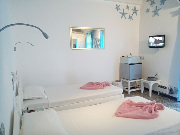 Imagen de la habitación del Hotel Cavala Seaside Resort. Foto 19