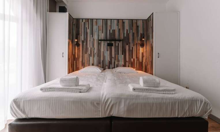 Imagen de la habitación del Hotel Cavalli. Foto 19