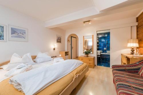 Imagen de la habitación del Hotel Cavallino Bianco - Weisses Roessl. Foto 7