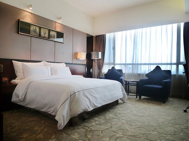 Imagen de la habitación del Hotel Cavan, Guangzhou. Foto 2
