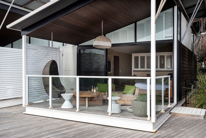 Imagen de la habitación del Hotel Caves Coastal Bar and Bungalows. Foto 7