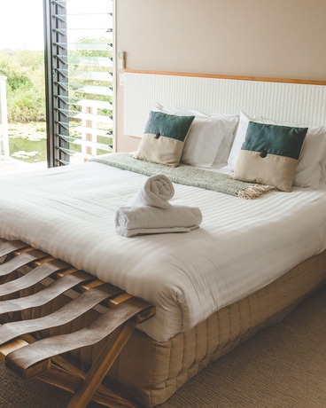 Imagen de la habitación del Hotel Caves Coastal Bar and Bungalows. Foto 8