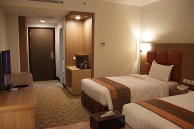 Imagen de la habitación del Hotel Cavinton Yogyakarta By Tritama Hospitality. Foto 3