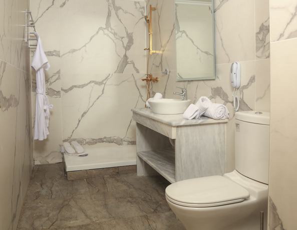 Imagen de la habitación del Hotel Cavomarina Beach. Foto 6