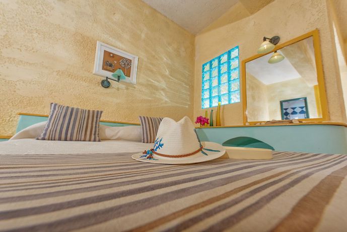 Imagen de la habitación del Hotel Cavos Bay And Studios. Foto 9