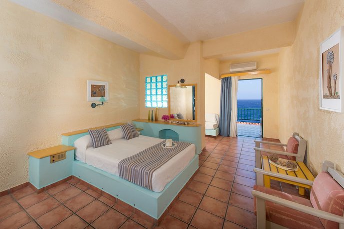 Imagen de la habitación del Hotel Cavos Bay And Studios. Foto 14