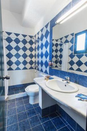 Imagen de la habitación del Hotel Cavos Bay & Studios. Foto 8