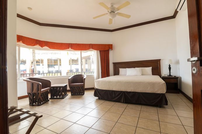 Imagen de la habitación del Hotel Cayman Suites, El Garit&oacute;n. Foto 6