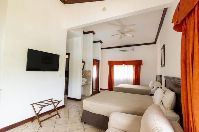 Imagen de la habitación del Hotel Cayman Suites, El Garit&oacute;n. Foto 7