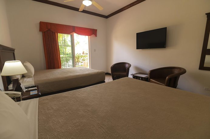 Imagen de la habitación del Hotel Cayman Suites, El Garit&oacute;n. Foto 8