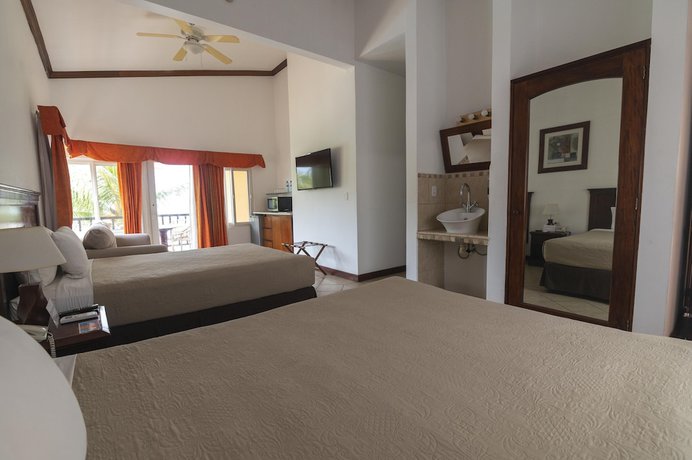 Imagen de la habitación del Hotel Cayman Suites, El Garit&oacute;n. Foto 11