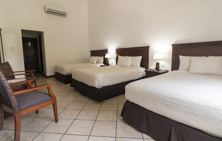 Imagen de la habitación del Hotel Cayman Suites, El Garit&oacute;n. Foto 12