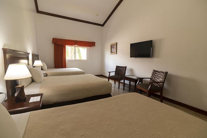 Imagen de la habitación del Hotel Cayman Suites, El Garit&oacute;n. Foto 14