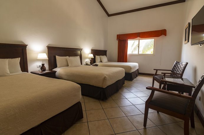 Imagen de la habitación del Hotel Cayman Suites, El Garit&oacute;n. Foto 15