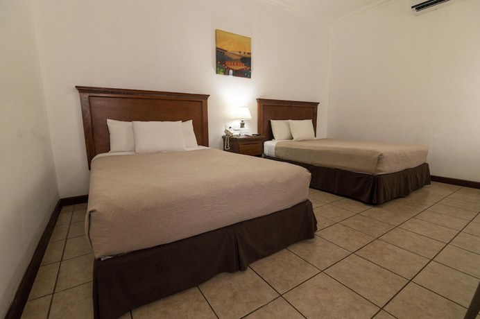 Imagen de la habitación del Hotel Cayman Suites, El Garit&oacute;n. Foto 17