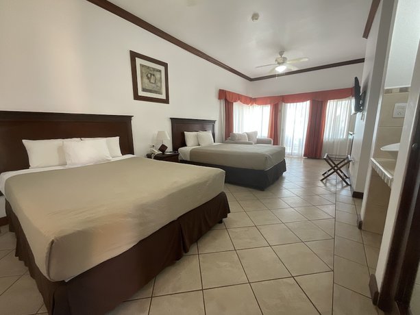 Imagen de la habitación del Hotel Cayman Suites, El Garit&oacute;n. Foto 19