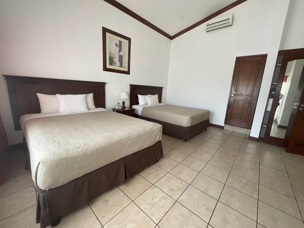 Imagen de la habitación del Hotel Cayman Suites, El Garit&oacute;n. Foto 20