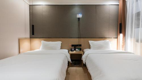 Imagen general del Hotel 海菲酒店 郑州高铁东站CbD国际会展中心店. Foto 7