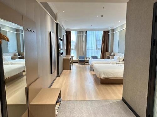 Imagen general del Hotel 海菲酒店 郑州高铁东站CbD国际会展中心店. Foto 9