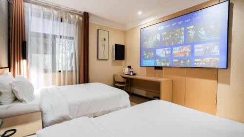 Imagen general del Hotel 海菲酒店 郑州高铁东站CbD国际会展中心店. Foto 10