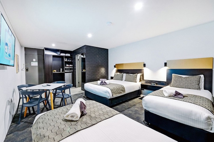 Imagen de la habitación del Hotel Cbd Motor Inn. Foto 12