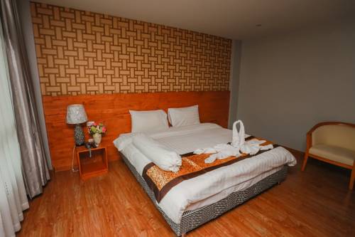 Imagen de la habitación del Hotel Cbd Suratthani. Foto 4