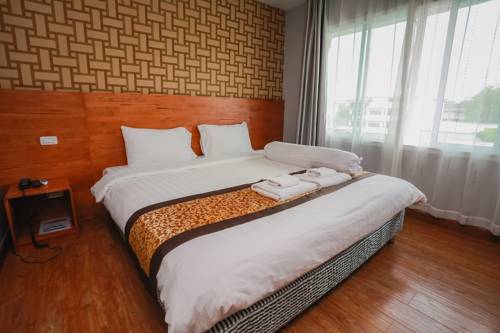 Imagen de la habitación del Hotel Cbd Suratthani. Foto 7
