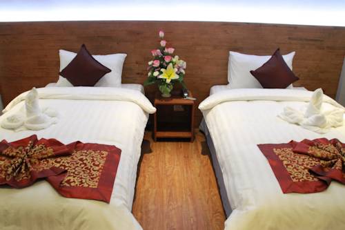 Imagen de la habitación del Hotel Cbd Suratthani. Foto 10