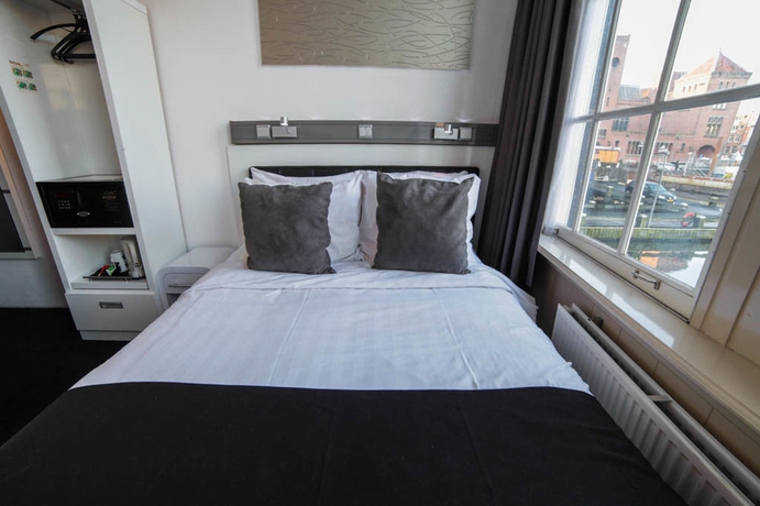 Imagen de la habitación del Hotel Cc, Ámsterdam. Foto 8