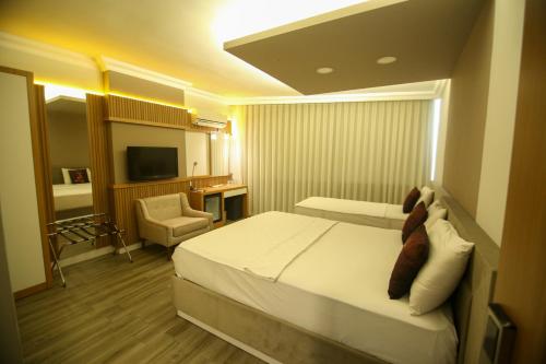 Imagen de la habitación del Hotel &Ccedil;EVİK PALACE HOTEL. Foto 18