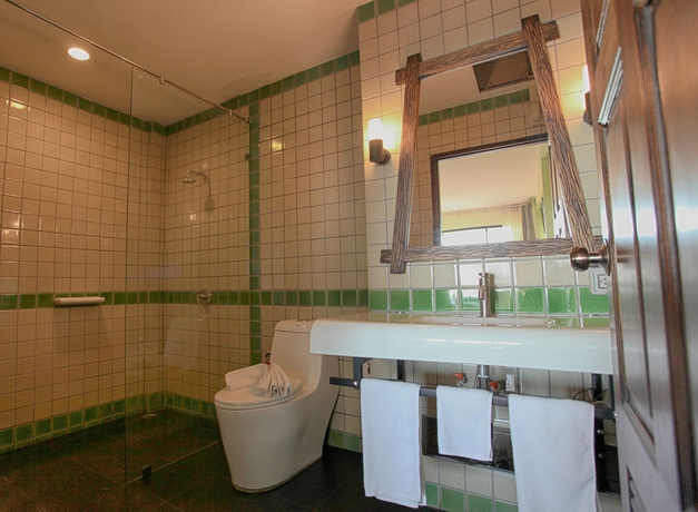 Imagen de la habitación del Hotel Cc's Hideaway. Foto 6