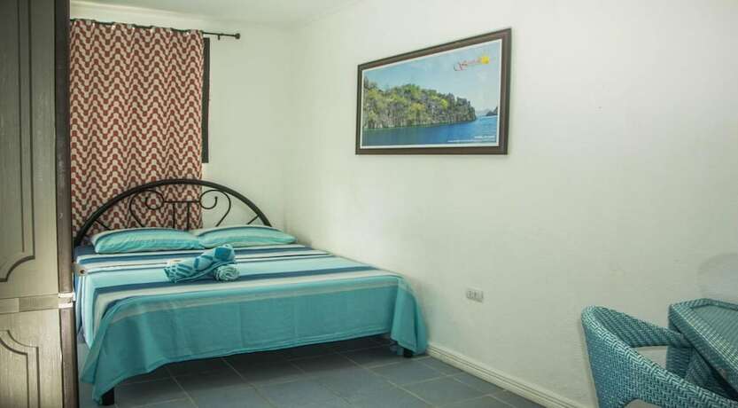 Imagen de la habitación del Hotel Cebu Golf Course. Foto 19