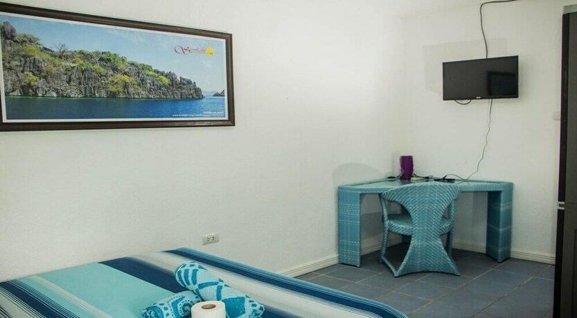 Imagen de la habitación del Hotel Cebu Golf Course. Foto 24