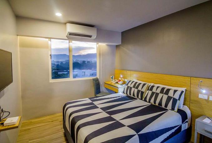 Imagen de la habitación del Hotel Cebu Plus. Foto 12