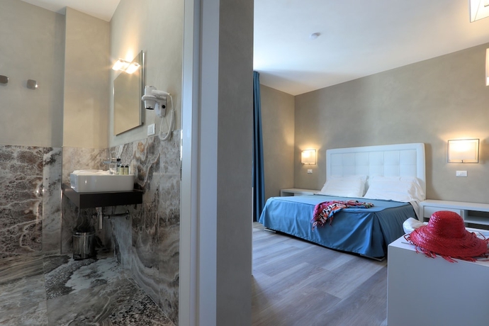 Imagen de la habitación del Hotel Cecina Beach. Foto 8