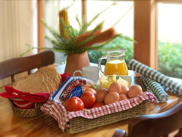Imagen del bar/restaurante del Hotel Cedar Creek Cottages. Foto 6