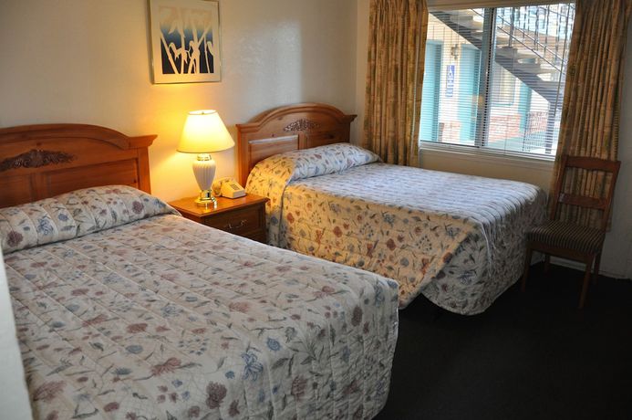 Imagen de la habitación del Hotel Cedar Inn and Suites. Foto 3