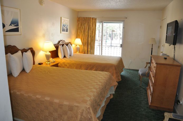 Imagen de la habitación del Hotel Cedar Inn and Suites. Foto 4