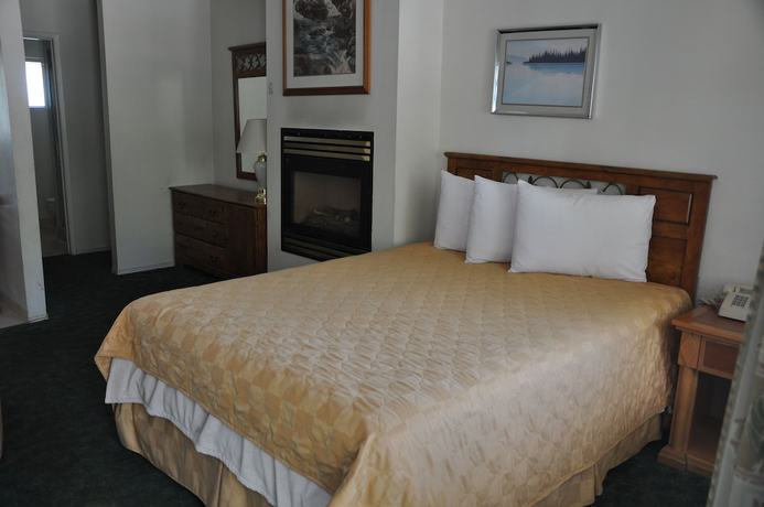 Imagen de la habitación del Hotel Cedar Inn and Suites. Foto 5
